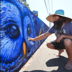 Photo of Drake Arnold Spray Painting